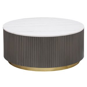 Center your living space with this elegant, modern round coffee table. The genuine white marble top exudes sophistication with its subtle veining, adding organic flair. The clean, light coloration complements any surrounding decor. A ribbed, engineered wo