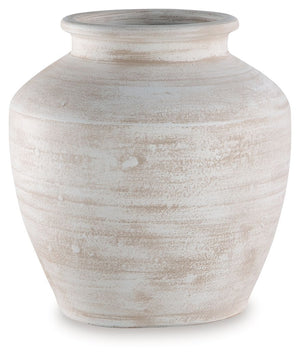 Celebrate the artisanal character of ceramics with this vase. Its distressed white finish has a time-worn, weathered appeal, offering the look of the past with a modern feel. The vase-'s neutral tone makes it a go-to for all seasons, allowing you to stage