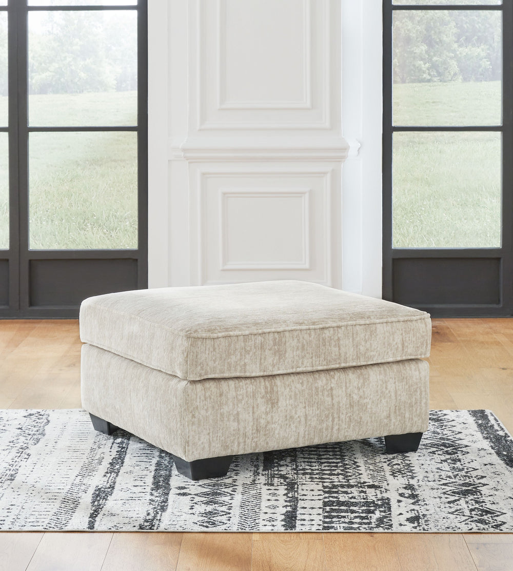 This oversized ottoman speaks to those drawn to fresh, contemporary style with richly neutral appeal. The footrest-'s generous size invites everyone to delight in its comfort. Subtle and sophisticated, the plush upholstery and dark tri-block legs are a na