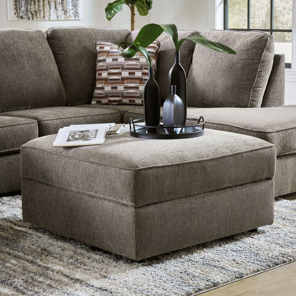 Complete your at-home retreat with this casually chic ottoman. The luxe herringbone chenille upholstery is indulgently plush to the touch. A flip top conceals additional storage space. With its clean-lined construction, this ottoman seamlessly pairs with 