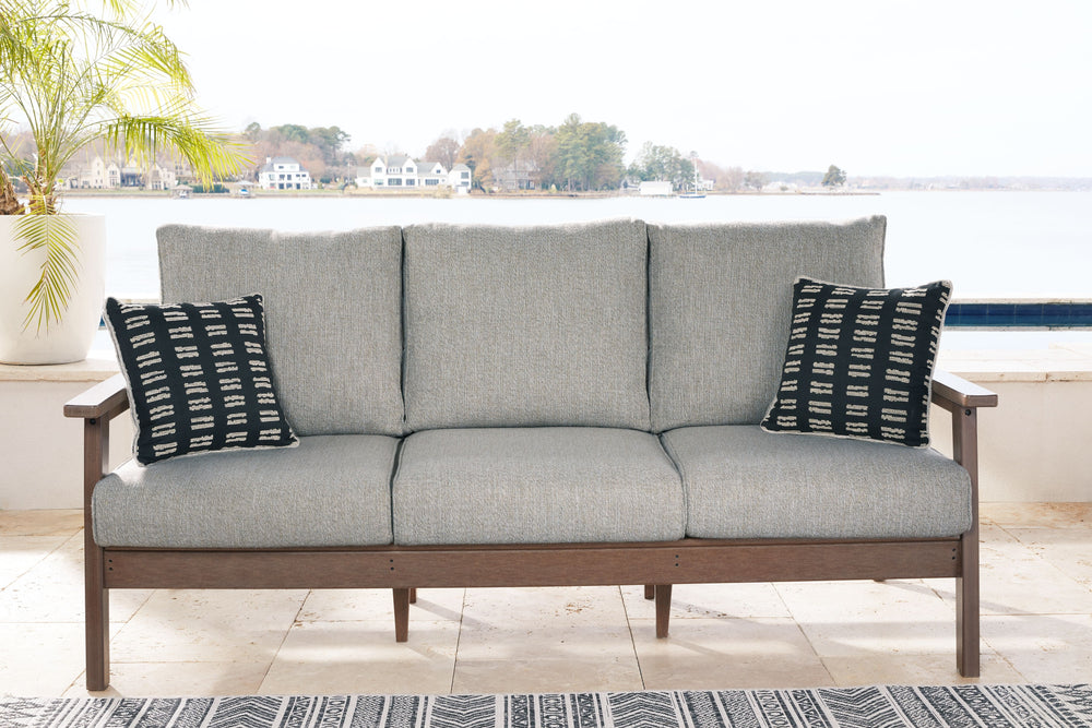 Get back to nature with the relaxed styling of this outdoor sofa with cushions. Crafted of MEGA-TUFFÂ® HDPE material, it combines the exceptional durability and weather resistance you need with the â€œwood lookâ€ you love. Rest assured, the cushions are 