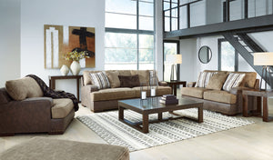 Punctuated by a subtle band of nailhead trim, this collection is perfect for those who love the look of leather. Two textural tones provide twice the style and comfortâ€”and incorporate an added layer of visual interest. Throw pillows add a fun decorative