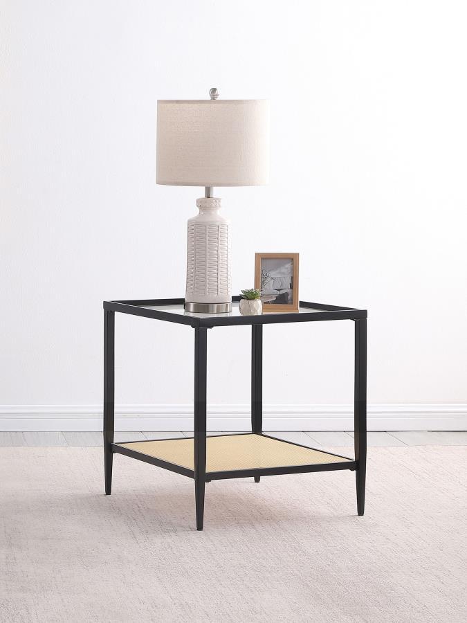 Bring a touch of modern elegance to your living space with this sleek square end table. The black powder-coated metal frame provides a minimalist yet sturdy foundation, while the recessed clear tempered glass top adds a sophisticated, airy feel. Below, a 