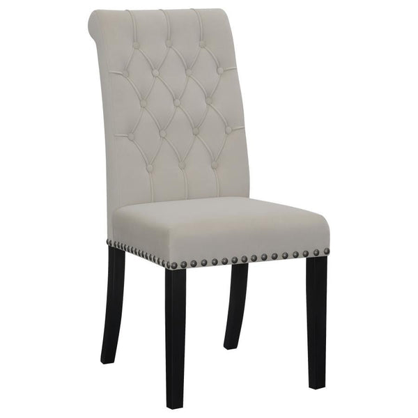  adding depth and sophistication. A rolled top and hand-applied nailhead trim create refined detailing