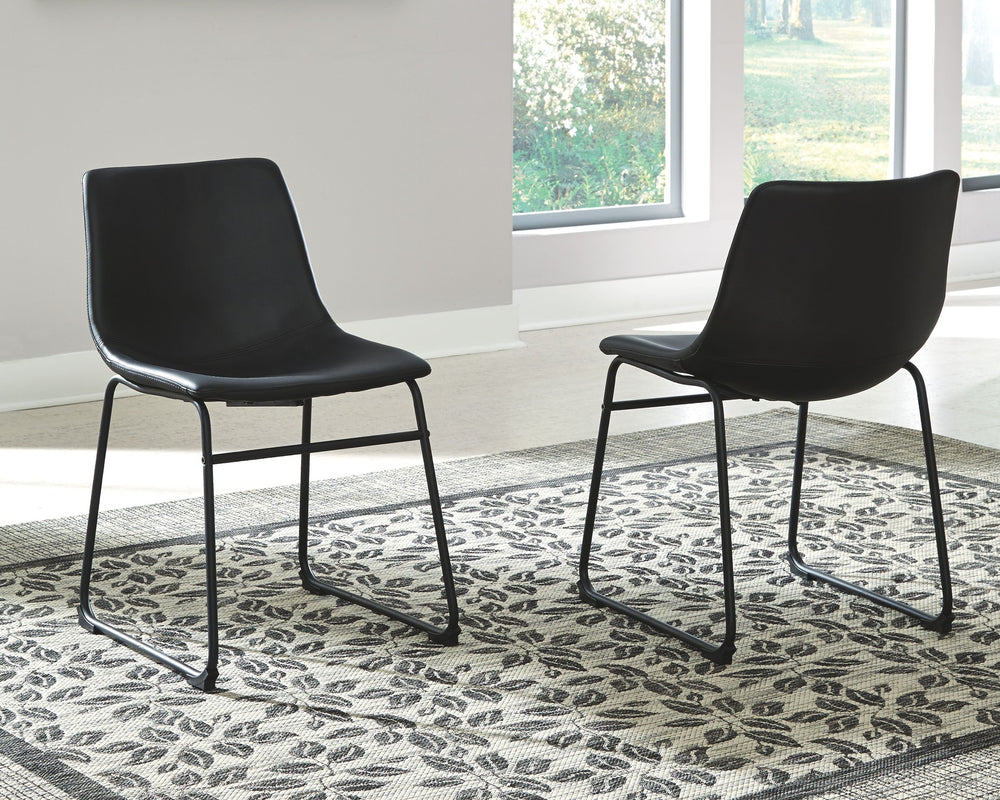With its distinctive contoured bucket seat and tubular metal base, this striking dining chair serves up a fresh twist on mid-century inspired style. Faux leather upholstery has a charmingly vintage tone and a color-coordinated frame. What a timeless look 