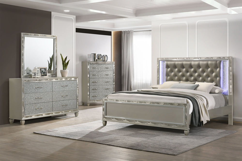 Discover the Radiance Western King 4 Piece Bedroom Set in Platinum Silver, meticulously crafted to offer unparalleled stability and durability from a combination of Solid Rubberwood and manufactured woods. Its semi-gloss lacquer Platinum Silver finish len