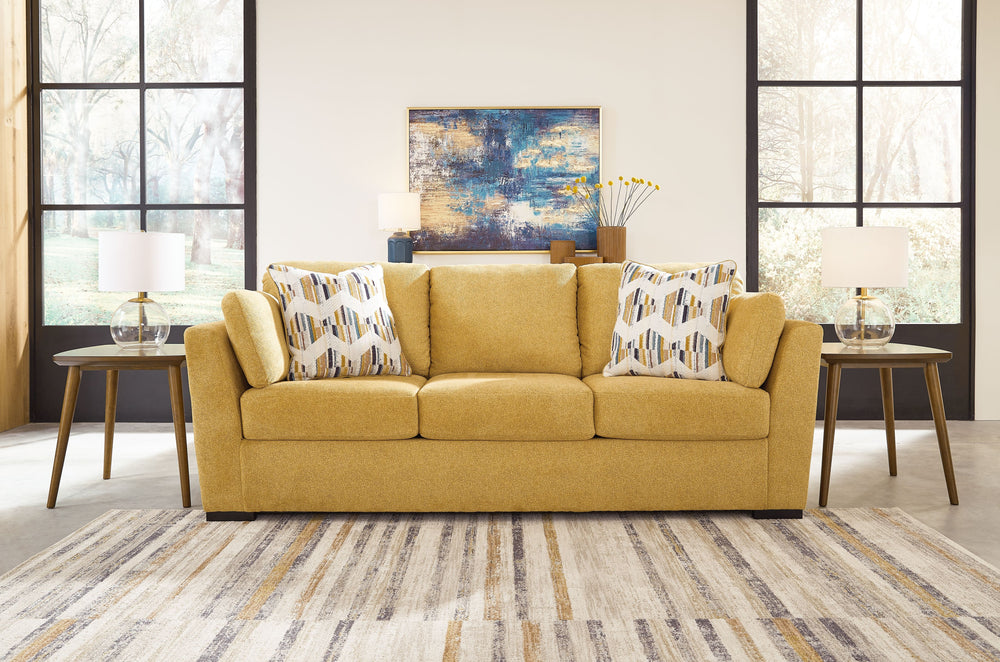 You want your home to reflect your modern, trendy eye for design. This sofa is here to help. Bold, bright and beautiful, it adds a fashion-forward pop of color to your living room. Velvet-like upholstery and matching bolster pillows keep comfort at top of