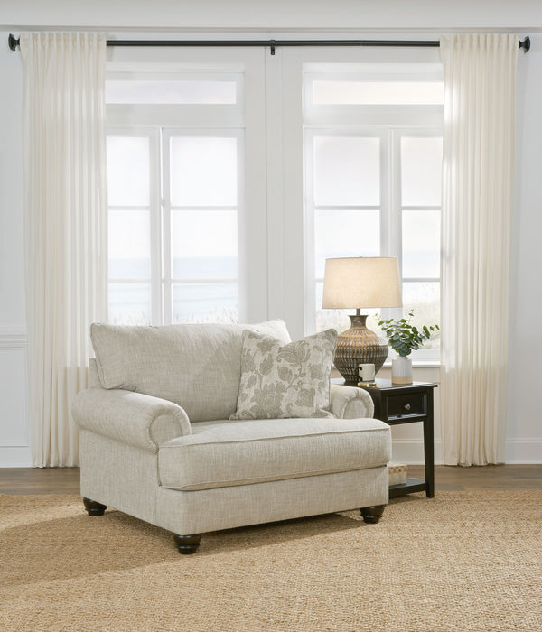  easygoing hue is enhanced by even lighter flax peeking through. Distinctive roll arms add a dab of debonair