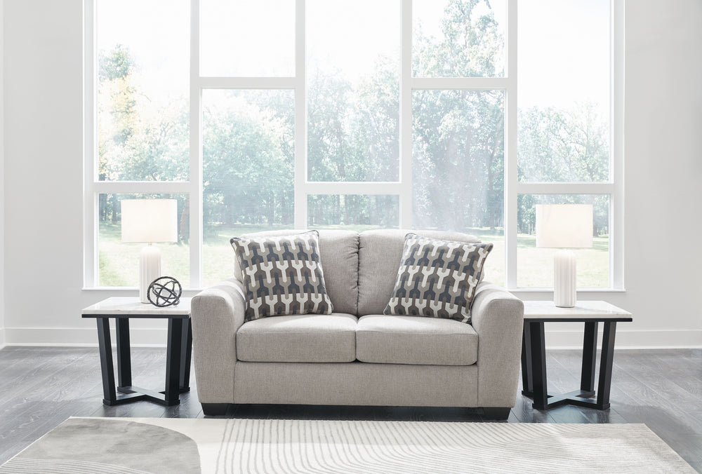 Need a simple style refresh? Liven up your space with this loveseat. Its sleek design invites you to sink into the generous cushions. Plush, textured upholstery creates a captivating look that works for aesthetics ranging from classic to contemporary. Sin
