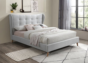  and button tufting exudes timeless elegance and contemporary comfort. The fully upholstered bed features a distinct and sophisticated headboard designed with wing back and button tu
