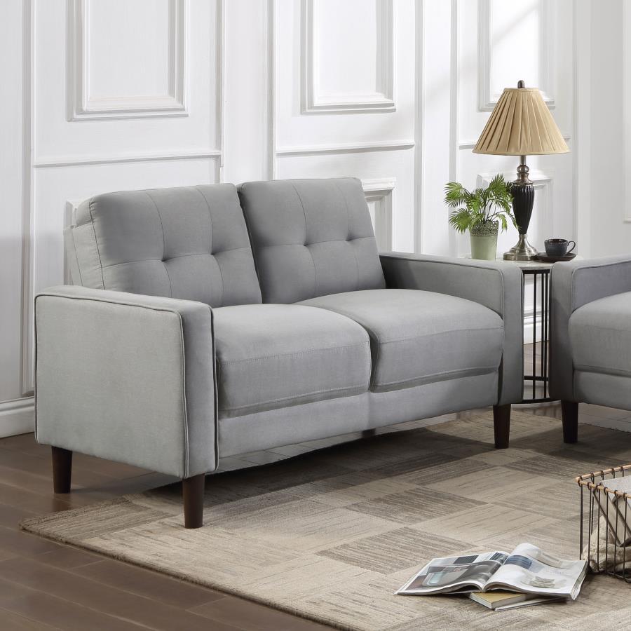 Ideal for studio apartments or small rooms, this loveseat boasts a perfect small-scale design. Its classic track arm and self-welt detailing highlight the superior tailoring. The grid-tufted boxed back cushions and pocket coil spring cushion construction 