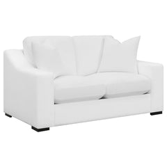 Create your transitional living room interior with this contemporary, white loveseat, upholstered in a white trillium polyester blend fabric throughout its sloped track armrests and top -stitched reversible cushions. A solid wood frame offers long-lasting