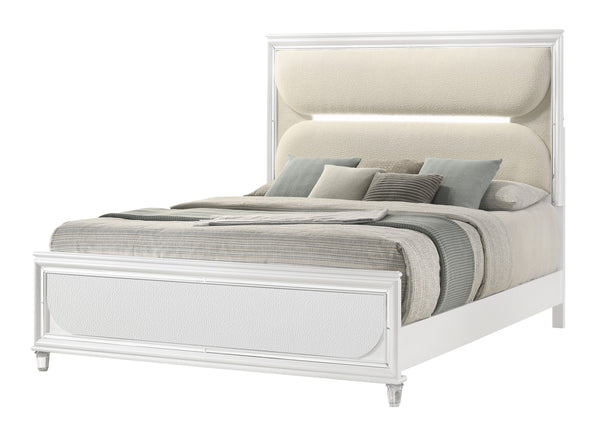  accented with sleek mirrored trim that adds a touch of shine and refinement. The centerpiece is an opulent bed with an oversized he