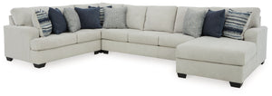 What a pleasant surprise: high-end luxury made comfortably affordable. Thatâ€™s what makes this sectional with chaise in stone gray so alluring. Made exclusively for those wanting to make a designer statement, this finely crafted sectional is dressed to i