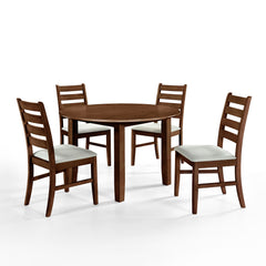 Experience the Pascal 5 Piece Dining Room Set in warm Walnut Brown, featuring a round wood table and four dining chairs. Crafted from a blend of solid Rubberwood and manufactured woods, this set ensures long-lasting durability. The solid wood chairs are r
