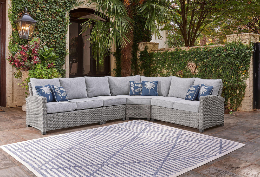 Indulge in backyard bliss. This outdoor sectional has a straightforward sense of style with its light gray resin wicker and wood-look finish. Gray high-performance NuvellaÂ® Premium fabric covers the seat and back cushions, weathering the elements and kee