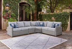 Indulge in backyard bliss. This outdoor sectional has a straightforward sense of style with its light gray resin wicker and wood-look finish. Gray high-performance NuvellaÂ® Premium fabric covers the seat and back cushions, weathering the elements and kee