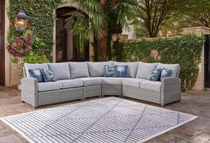 Indulge in backyard bliss. This outdoor sectional has a straightforward sense of style with its light gray resin wicker and wood-look finish. Gray high-performance NuvellaÂ® Premium fabric covers the seat and back cushions, weathering the elements and kee