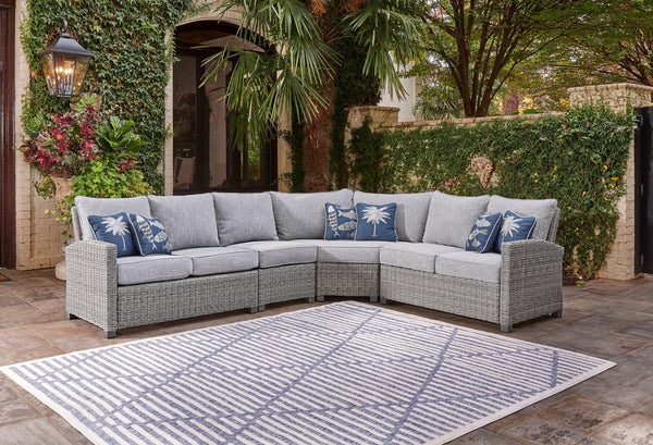 Indulge in backyard bliss. This outdoor sectional has a straightforward sense of style with its light gray resin wicker and wood-look finish. Gray high-performance NuvellaÂ® Premium fabric covers the seat and back cushions, weathering the elements and kee