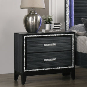 Classic design with touches of modern aspects makes this Haiden Nightstand ideal for any bedroom. The piece offers a rectangular tabletop and two storage drawers for displaying or organizing. It also features a glamorous shimmering silver accent trim that