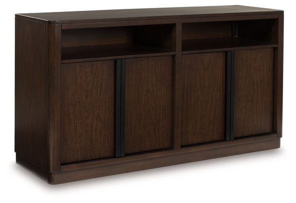 Casual contemporary styling with a decidedly modern vibe. This dining server dresses your dining spot in on-trend elegance with its rich warm brown finish. Full-length metal pulls in a matte black tone add a subtly cool touch to spacious storage cabinets.