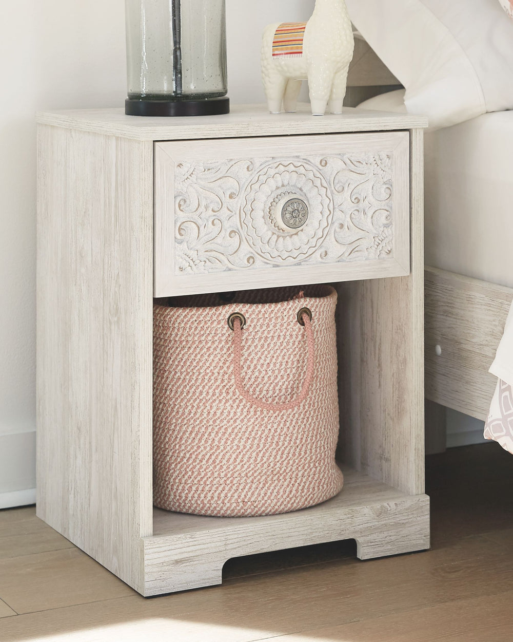 If itâ€™s coastal chic or cottage quaint style you long for, this whitewashed nightstand invites you to go to town. Its distinctive weatherworn finish conveys an easy-breezy sensibility, perfect for a restful bedroom retreat. Rest assured, tastefully edit