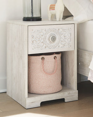  this whitewashed nightstand invites you to go to town. Its distinctive weatherworn finish conveys an easy-breezy sensibility