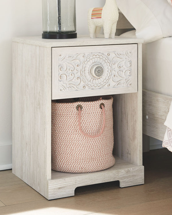  this whitewashed nightstand invites you to go to town. Its distinctive weatherworn finish conveys an easy-breezy sensibility