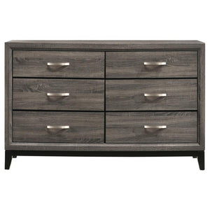  exposed wood grain constructed of oak. Tapered legs in a black finish offer a modern feel