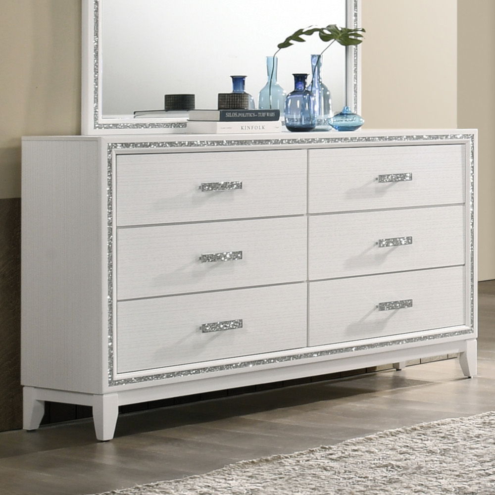 Classic design with touches of modern aspects makes this Haiden Dresser ideal for any bedroom. The piece offers a rectangular tabletop and six storage drawers for displaying or organizing. It also features a glamorous shimmering silver accent trim that ad