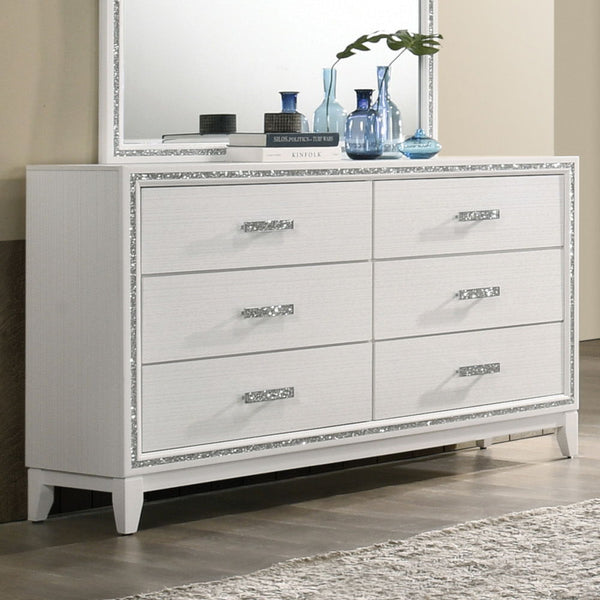Classic design with touches of modern aspects makes this Haiden Dresser ideal for any bedroom. The piece offers a rectangular tabletop and six storage drawers for displaying or organizing. It also features a glamorous shimmering silver accent trim that ad