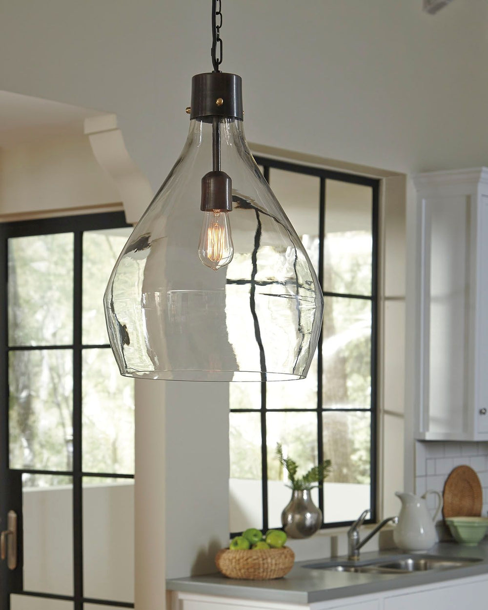 Lighten up in minimalist chic style with this pendant light. However it graces your space, its shapely teardrop design beautifully goes with the flow.<br><br><b>Additional Dimensions</b><br><ul><li>Cord length: 105-"</li><li>Shade: 0-"</li></ul><br/><br/>