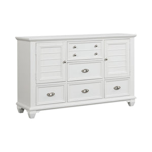The Jamestown Wood Dresser in White offers a perfect combination of durability, style, and functionality, making it an essential addition to any bedroom. Expertly crafted from solid Acacia, premium manufactured woods, and authentic Oak veneers, this dress