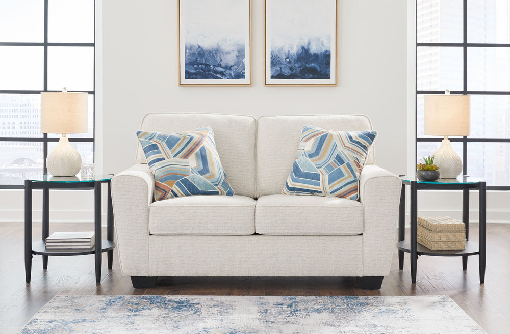 Need a simple style refresh? Liven up your living room essentials with this loveseat. A chunky silhouette holds invitingly ample cushioning you-'ll long to lounge in. Crosshatched upholstery and accent pillows give the otherwise casual design a delightful