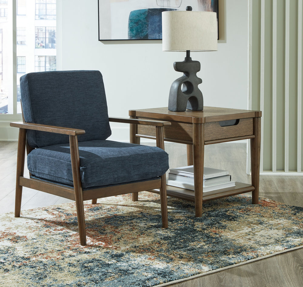 Feed your mid-century modern nostalgiaâ€”with a contemporary twist. A vibrant trend-right hue and comfy feel make this accent chair perfect for lounging solo or with friends and family. Its linear profile adds plenty of fresh style, and the tapered accent