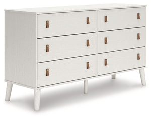 Dare to take minimalism to the max. This dresser has an air of sleek simplicity thanks to its white painted finish with subtle replicated wood grain. The magnificently mod splay legs are a compelling complement to its streamlined design. And with two sets