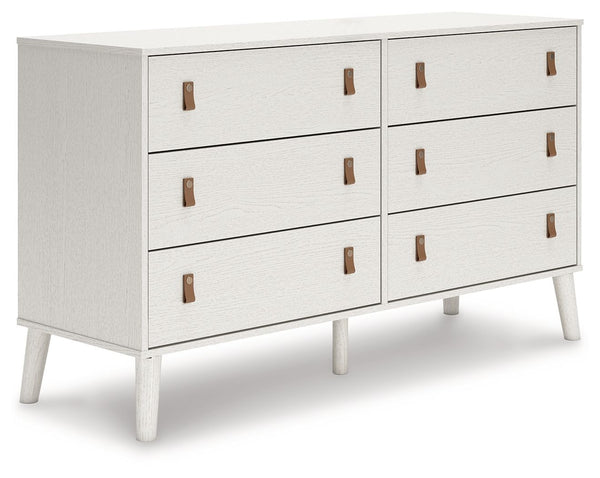 Dare to take minimalism to the max. This dresser has an air of sleek simplicity thanks to its white painted finish with subtle replicated wood grain. The magnificently mod splay legs are a compelling complement to its streamlined design. And with two sets