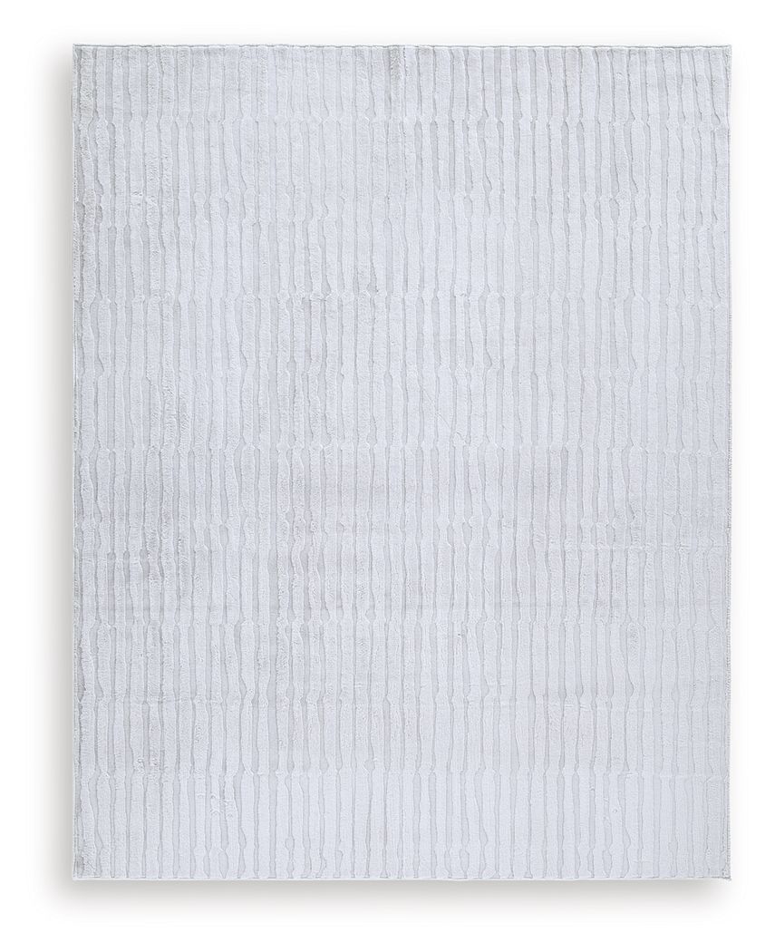 Impress with contemporary cool character. This rug welcomes visitors with subtle stripes and soft faux fur underfoot, while its neutral gray is an understated way to dress up your floor. Plus it-'s machine washable for fuss-free cleaning.<br/><br/><b>Prod
