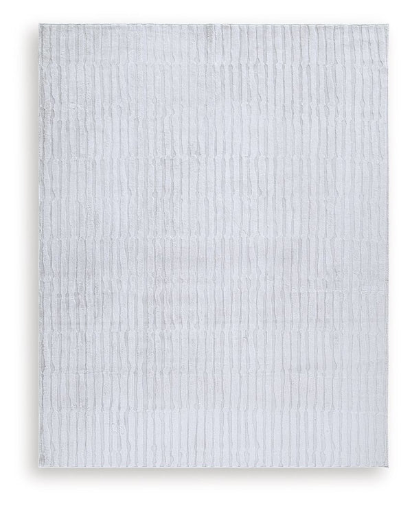 Impress with contemporary cool character. This rug welcomes visitors with subtle stripes and soft faux fur underfoot, while its neutral gray is an understated way to dress up your floor. Plus it-'s machine washable for fuss-free cleaning.<br/><br/><b>Prod