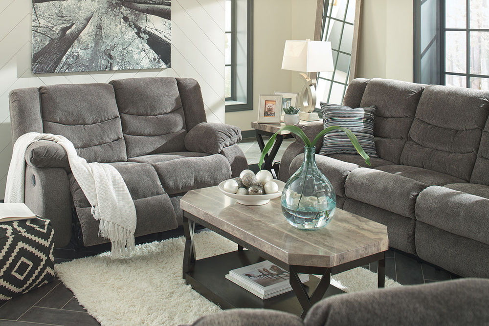 This reclining set puts the win in winning. Its waterfall back design and doubly plump pillow top arms team up with soft chenille fabric to go for the goal. Ample seating room makes the comfort possibilities endless. Sit back and relax. You wonâ€™t go wro