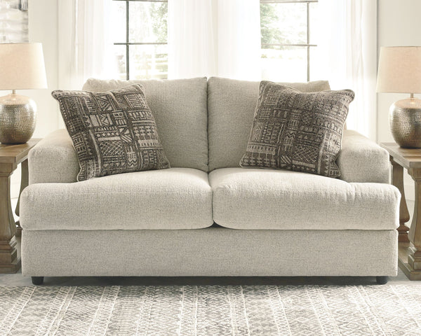  this loveseat puts the contemporary in your contemporary home. Its â€œthree over twoâ€ profile eliminates the center seat cushion