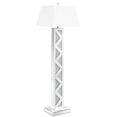 Bring bold glamour to your interior with this contemporary floor lamp, featuring a mirrored base adorned with sparkling crystal-like accents in a striking geometric pattern. A crisp white fabric shade adds contrast and diffuses soft ambient light. Perfect