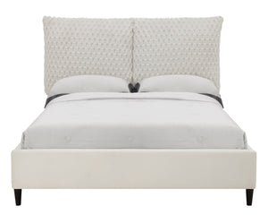 This luxurious bed is the centerpiece of a serene and sophisticated bedroom oasis. It features an opulent, tufted headboard that rises high to make a grand statement, upholstered in a sumptuous fabric that invites a touch of elegance and comfort. The bed-