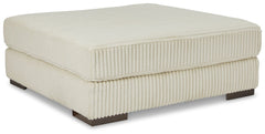 Plush and posh. Showcase your eye for on-trend texture with the statement-making cord upholstery of this oversized accent ottoman. Its stunningly soft fabric entices in an ivory hue, complementing contemporary color palettes. Let your feet sink into the s