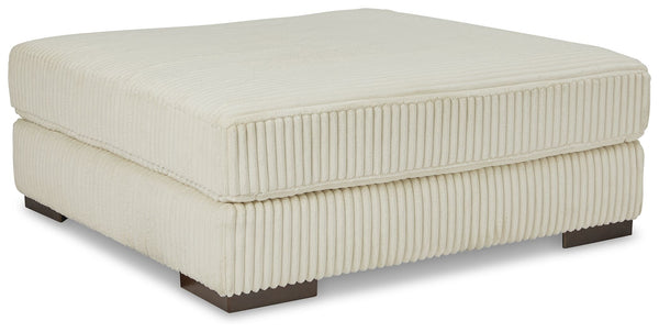 Plush and posh. Showcase your eye for on-trend texture with the statement-making cord upholstery of this oversized accent ottoman. Its stunningly soft fabric entices in an ivory hue, complementing contemporary color palettes. Let your feet sink into the s