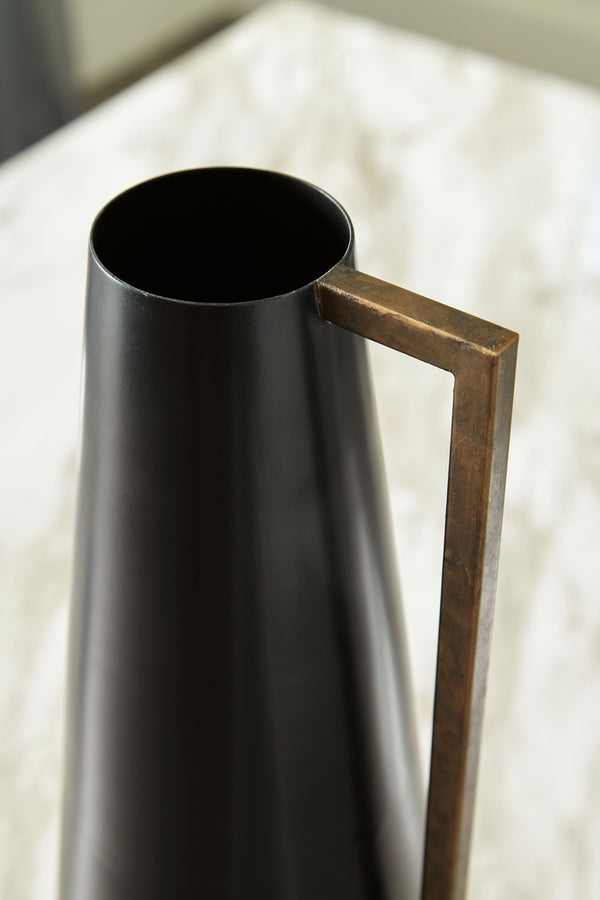  it-'s finished in a sleek black. An angular goldtone accent adds a dash of glam