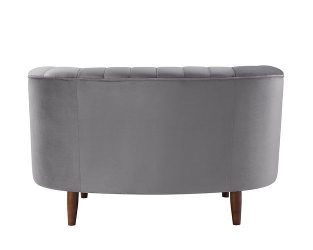 An ode to mid-century modern, the Millephri collection will help achieve this modern aesthetic. The pocket coil foam seating gives off the feel of sitting on a plush cloud. The pieces are upholstered in a gorgeous velvet fabric and feature deep channel tu