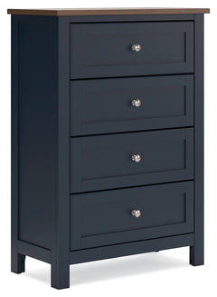 Add homespun charm to your restful retreat. A modern take on a timeless silhouette, this chest of drawers pairs a dark slate blue finish with a light brown top. Drawer fronts and legs in a classic Shaker style bring an air of beautiful simplicity to the b