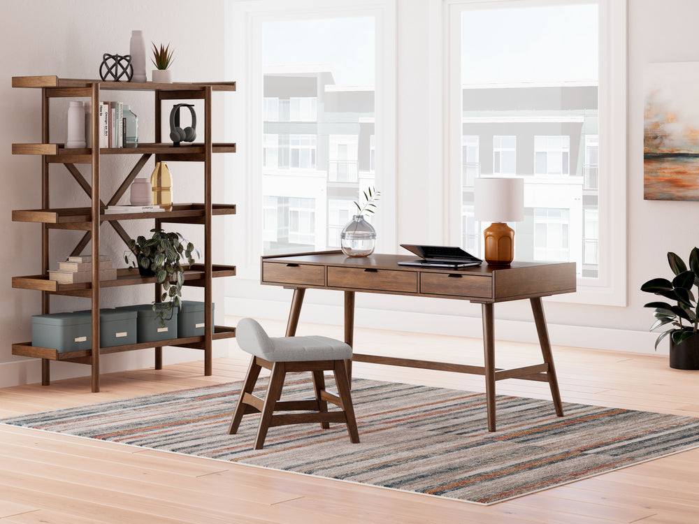Casual Contemporary design. Made with Rubberwood solids, Mango wood veneer and MDF substrates. Finished in a medium brown natural wood tone. Desk drawers feature French/English dovetail construction, fully finished interiors and heavy duty ball-bearing si