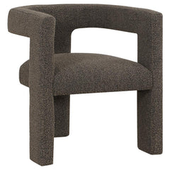 Enveloped entirely in the embrace of plush bouclÃ©, this chair redefines the art of relaxation with its all-fabric design. The seamless transition from the cushioned seat to the curved arms, all robed in the same soft fabric, creates a cocoon of comfort. 